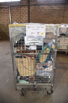 a metal cart with baskets on top of it in a warehouse