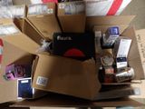 a pile of boxes that have various items in them