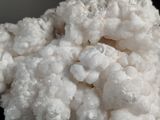 a close up of a pile of white crystals