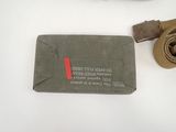 a belt and a wallet sitting on a table