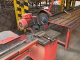 a machine that is working on a piece of metal