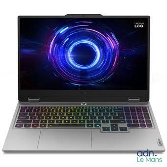 l'ordinateur portable est ouvert sur une surface blanche, avec un logo bleu et violet à l'écran