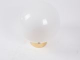 a close up of a white light bulb on a white surface