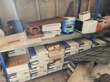 shelves with boxes and boxes on them in a storage room