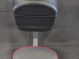 an overhead view of a machine with a seat on it