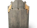 a wooden box that has a door on it