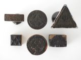 several different types of stamps and stamps on a white surface