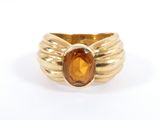 an image of a yellow gold ring with a citrine stone