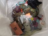 a bag full of clothes and other items in it