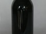 a bottle of wine that is sitting on a table