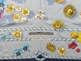 an image of a table cloth with flowers on it