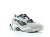 the puma sneakers are white and black with purple accents