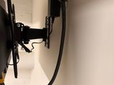 an image of a wall mounted tv mounted to the side of a wall