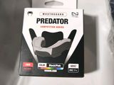 a box of predator competition series golf balls on a table