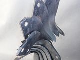 a metal sculpture of a bird made out of wrenches