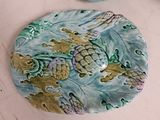 a picture of a plate with a sea turtle design on it