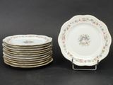a stack of plates that are sitting on a table