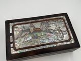 mother of pearl inlayed box with fish and fish on it
