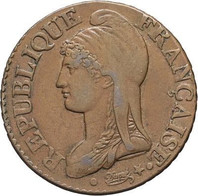 a close up of a coin with a woman ' s head on it