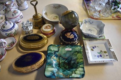 a table with a lot of decorative items on it