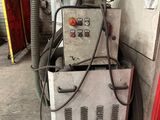 a machine that is sitting next to a wall