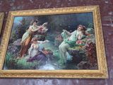 two paintings on the wall of a building with a painting of a woman and two other women