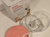 a blender and a bowl on a table