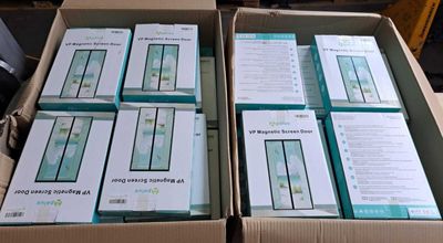several boxes of electronic devices are stacked on top of each other