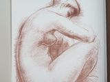 drawing of a nude woman sitting on her knees in a brown frame