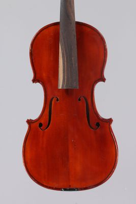 an old violin with a bow hanging from it ' s back