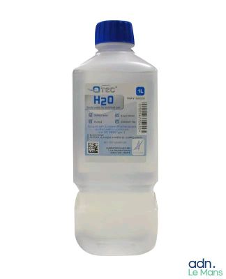 une image représentant une bouteille contenant un liquide sur fond blanc