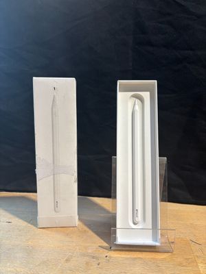 a white box with a white apple pencil inside of it