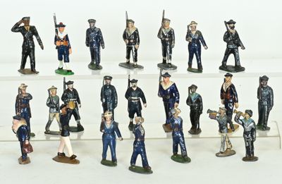 many figurines of men in uniform on a shelf