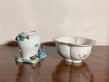 a small bowl and a small bowl on a table