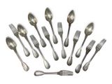 a lot of silver spoons and forks arranged in a circle