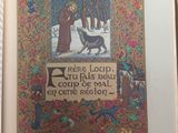 an open book with a picture of a person and a dog