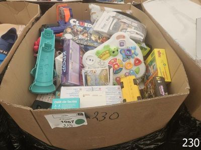a cardboard box filled with toys and other items