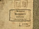 a close up of a piece of cloth with a label on it