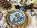 a plate with a picture of a hot air balloon on it sitting on a table