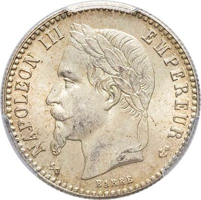 une pièce d'argent portant une tête d'homme et une couronne