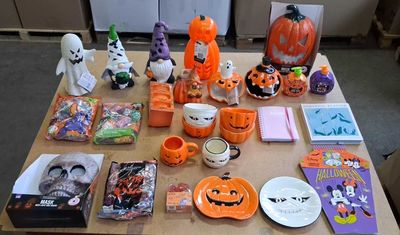 a table with a lot of halloween items on it