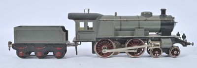 un petit train posé sur une surface blanche