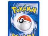 a close up of a pokemon card on a white surface
