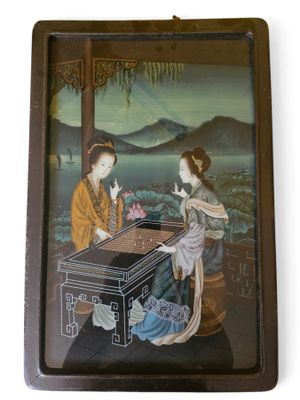 an image of a picture of two women playing a game of checkers