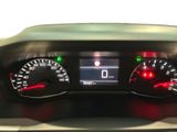 a close up of a car dashboard with various gauges