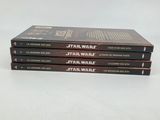 three star wars books stacked on top of each other on a white surface