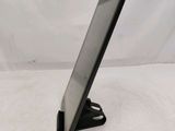 a tablet that is sitting on a stand on the table