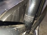 a close up of a bike with a sticker on it