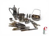 a lot of silver items that are on the table