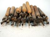 a pile of old wooden dows sitting on a table